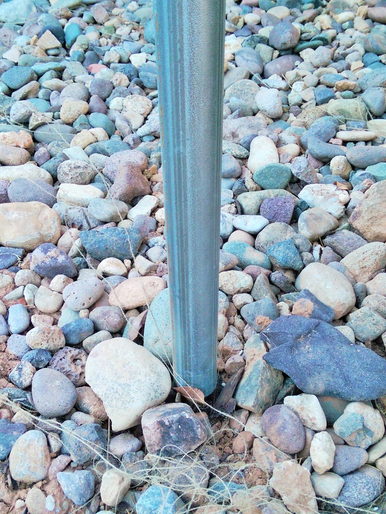Galvanized posts are now placed over the top of the green 